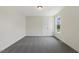 Cozy bedroom with large closet doors and a bright window view at 115 Arundel Dr, Archer Lodge, NC 27527