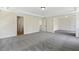 Expansive bedroom with neutral carpet and an open layout at 115 Arundel Dr, Archer Lodge, NC 27527