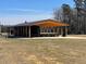 Picnic pavilion structure with table seating and a full roof. Located in a community park at 115 Arundel Dr, Archer Lodge, NC 27527