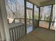 Relaxing screened porch providing ample space to enjoy the view with protection from the elements at 115 Arundel Dr, Archer Lodge, NC 27527