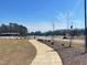 Sidewalk shot of the Archer Lodge Town Park including a playground and shelter at 116 Arundel Dr, Archer Lodge, NC 27527
