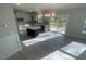 Spacious kitchen with a large island, stainless steel appliances, and hardwood floors at 116 Arundel Dr, Archer Lodge, NC 27527