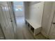 Convenient mudroom with a built-in bench and storage hooks at 116 Arundel Dr, Archer Lodge, NC 27527