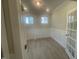 Cozy office space with wainscoting detail and bright lighting at 116 Arundel Dr, Archer Lodge, NC 27527