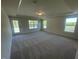 Spacious bedroom with multiple windows, trey ceilings and neutral carpet throughout at 118 Arundel Dr, Archer Lodge, NC 27527