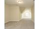 Finished attic with lots of space, dormers, and neutral tones at 1233 Azalea Garden Cir, Raleigh, NC 27603