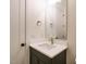 Clean bathroom with mirror, vanity, and lighting at 1233 Azalea Garden Cir, Raleigh, NC 27603