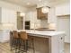 Modern kitchen featuring a large island, stainless steel appliances, and custom cabinets at 1233 Azalea Garden Cir, Raleigh, NC 27603