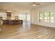 Spacious open-concept area shows kitchen, living, and dining areas at 1233 Azalea Garden Cir, Raleigh, NC 27603