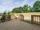 Nice wooden deck with backyard views, perfect for outdoor entertaining and relaxation at 1233 Azalea Garden Cir, Raleigh, NC 27603