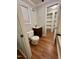 Clean bathroom with updated vanity and wood-look flooring at 31 Strickland Rd, Smithfield, NC 27577