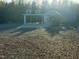 Gray house with carport and spacious yard at 31 Strickland Rd, Smithfield, NC 27577