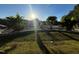 Landscaped front yard with tropical plants at 31 Strickland Rd, Smithfield, NC 27577