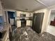 Modern kitchen with stainless steel appliances at 31 Strickland Rd, Smithfield, NC 27577