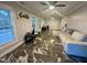 Living room with sectional sofa and tile floor at 31 Strickland Rd, Smithfield, NC 27577