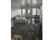 Living room with sectional sofa and tile floors at 31 Strickland Rd, Smithfield, NC 27577