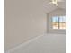 Cozy bedroom with a large window providing natural light and a peaceful view at 5093 Nc 56 Hwy, Franklinton, NC 27525
