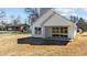 Exterior view of house with a covered patio and ample backyard space at 5093 Nc 56 Hwy, Franklinton, NC 27525