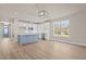 Open floor plan featuring a kitchen with island, a dining area, and lots of natural light at 5093 Nc 56 Hwy, Franklinton, NC 27525