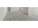 Bedroom featuring plush neutral carpeting, large windows for natural light, and fresh paint at 55 Diamond Creek Dr, Zebulon, NC 27597