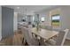 Open-concept dining area connected to a modern kitchen, perfect for entertaining and Gathering meals at 55 Diamond Creek Dr, Zebulon, NC 27597
