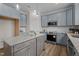 Modern kitchen featuring stainless steel appliances, stylish countertops, and ample cabinet space at 55 Diamond Creek Dr, Zebulon, NC 27597