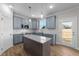 Bright kitchen with a center island, modern appliances, and ample cabinet space at 55 Diamond Creek Dr, Zebulon, NC 27597