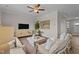 Comfortable living room featuring stylish decor, hardwood floors, and ample seating at 55 Diamond Creek Dr, Zebulon, NC 27597