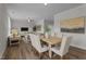 Inviting living room featuring hardwood floors, natural light, and a stylish decor at 55 Diamond Creek Dr, Zebulon, NC 27597