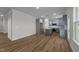 Spacious open floor plan with kitchen, dining, and living areas all flowing seamlessly at 55 Diamond Creek Dr, Zebulon, NC 27597