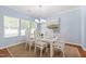 Charming dining room with ample natural light, stylish chandelier, and comfortable seating at 809 Davidson Point Rd, Cary, NC 27513