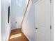 Bright entryway with hardwood floors, a staircase, and a large window for natural light at 809 Davidson Point Rd, Cary, NC 27513