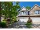 Beautiful townhome with attached garage, driveway, and landscaped front yard at 809 Davidson Point Rd, Cary, NC 27513