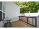 Private patio area perfect for enjoying the outdoors with table and chair set at 809 Davidson Point Rd, Cary, NC 27513