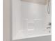 Modern shower with tiled walls, built-in seat, and sleek chrome fixtures at 809 Davidson Point Rd, Cary, NC 27513