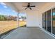 Covered back porch overlooking the yard, perfect for outdoor relaxation at 22 Laramie Ln, Selma, NC 27576