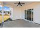 Covered patio, complete with a ceiling fan, perfect for enjoying the outdoors at 22 Laramie Ln, Selma, NC 27576