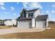 Charming two-story home with a three-car garage and well-maintained lawn at 22 Laramie Ln, Selma, NC 27576