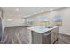 Kitchen island with sink and stainless steel dishwasher at 332 Squirrel Oaks Ln, Garner, NC 27529