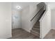 Inviting entryway features stairs with carpet and wood trim and a white front door at 41 Red River Dr, Selma, NC 27576
