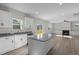 Modern kitchen area flows into the living room, creating an open floor plan at 41 Red River Dr, Selma, NC 27576