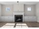 Living room with fireplace and built-in shelving at 41 Red River Dr, Selma, NC 27576