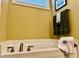 Clean bathroom with soaking tub and neutral color palette at 412 Airedale Trl, Garner, NC 27529