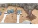 Aerial view of two houses and neighborhood, showcasing landscaping and a quiet setting at 55 Basil Ct, Franklinton, NC 27525