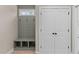 Functional coat closet with bench and cubbies, ideal for storage at 55 Basil Ct, Franklinton, NC 27525