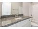 Bathroom with granite countertop, single sink and bathtub at 927 Micro W Rd, Selma, NC 27576