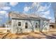 Exterior view of a light grey house with vinyl siding at 927 Micro W Rd, Selma, NC 27576