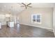 Open living room and kitchen with vinyl plank flooring at 927 Micro W Rd, Selma, NC 27576