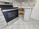This kitchen features stainless steel appliances and plenty of storage space at 108 N Woodshed Ct, Cary, NC 27513