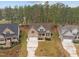 Aerial view of house and surrounding neighborhood at 184 Dereham Ln, Garner, NC 27529